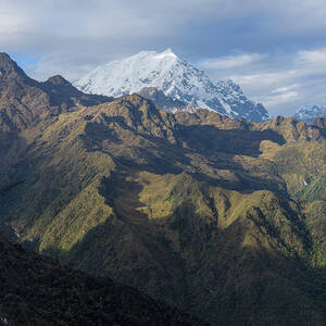 Majestic Andes Mountain Peaks Under Cloudy Sky by Brandon Wichmann Majestic Andes Mountain Peaks Under Cloudy Sky by Brandon Wichmann