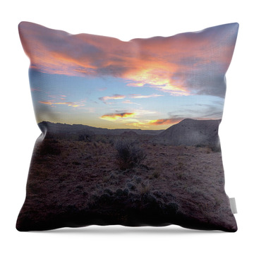 Desert Sunset Over Rugged Terrain Throw Pillow