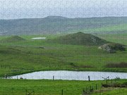 Tranquil Green Hills And Distant Sea Jigsaw Puzzle