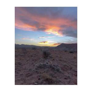 Desert Sunset Over Rugged Terrain by Brandon Wichmann