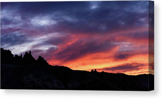 Vivid Twilight over Rocky Silhouette Canvas Art Print by Brandon Wichmann