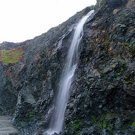 Secluded Coastal Waterfall Cascade by Brandon Wichmann