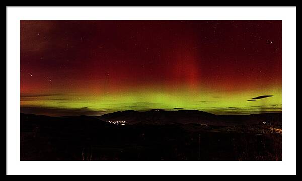 Northern Lights Over Mountain Range Framed Print