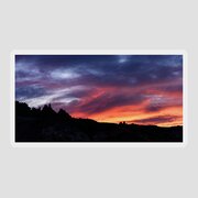 Vivid Twilight over Rocky Silhouette Sticker