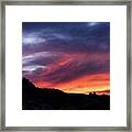 Vivid Twilight over Rocky Silhouette Framed Print