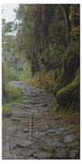 Moss-covered Path Through Lush Forest On The Inca Trail Beach Towel