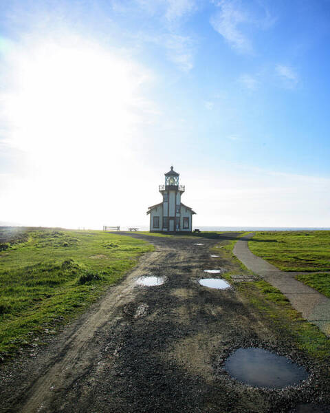 Lighthouse Under A Bright Sky Poster