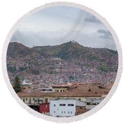 Rooftops and Hills of Cusco Round Beach Towel