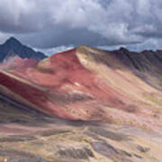 Rainbow Mountain Range Under Cloudy Skies Poster