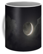 Shimmering Crescent Among Clouds Coffee Mug