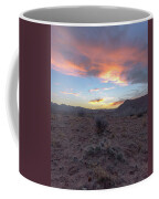 Desert Sunset Over Rugged Terrain Coffee Mug