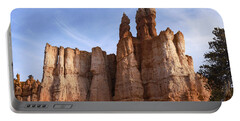 Majestic Rock Formations Under Blue Sky In Bryce Canyon National Park Portable Battery Charger