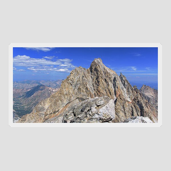 Majestic Mountain Peak Under Clear Skies Sticker
