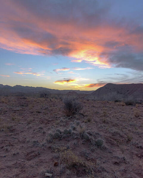 Desert Sunset Over Rugged Terrain Art Print