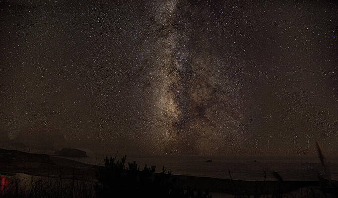 Nature Wall Art featuring the photograph Milky Way Over Tranquil Shoreline by Brandon Wichmann