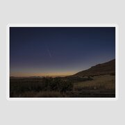 Twilight Comet Over Desert Landscape Sticker