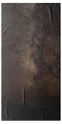 Milky Way Over Tranquil Shoreline Beach Towel