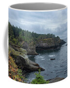 Serene Coastal Cliffs at Dawn Coffee Mug