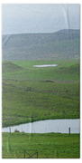 Tranquil Green Hills And Distant Sea Beach Towel