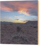 Desert Sunset Over Rugged Terrain Wood Print