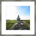 Lighthouse Under A Bright Sky Framed Print