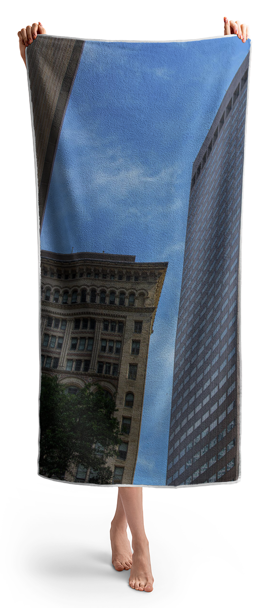 Skyscrapers Against Blue Sky Beach Towel