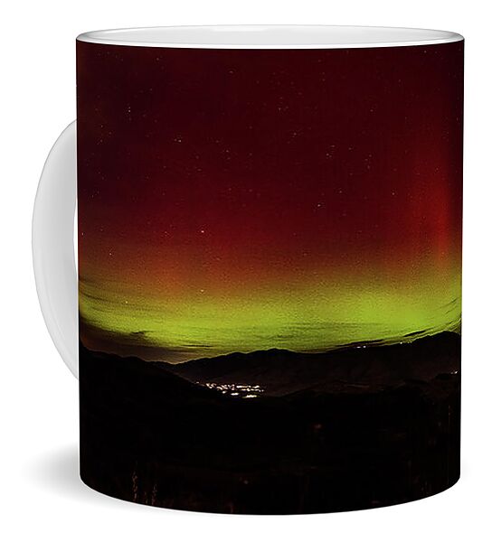 Northern Lights Over Mountain Range Coffee Mug