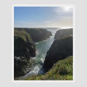 Dramatic Coastal Cliff Scene Sticker