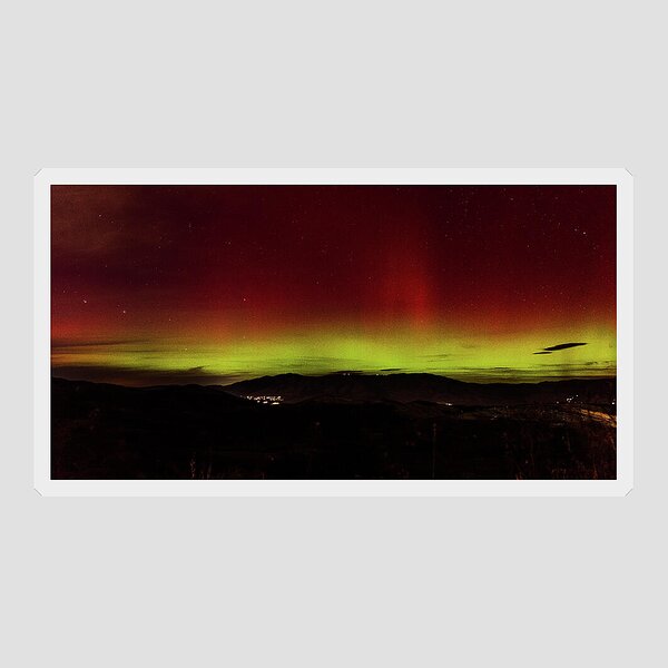 Northern Lights Over Mountain Range Sticker