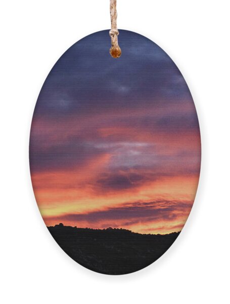 Vivid Twilight over Rocky Silhouette Ornament