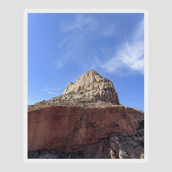 Majestic Mountain Peak Under Blue Sky Sticker