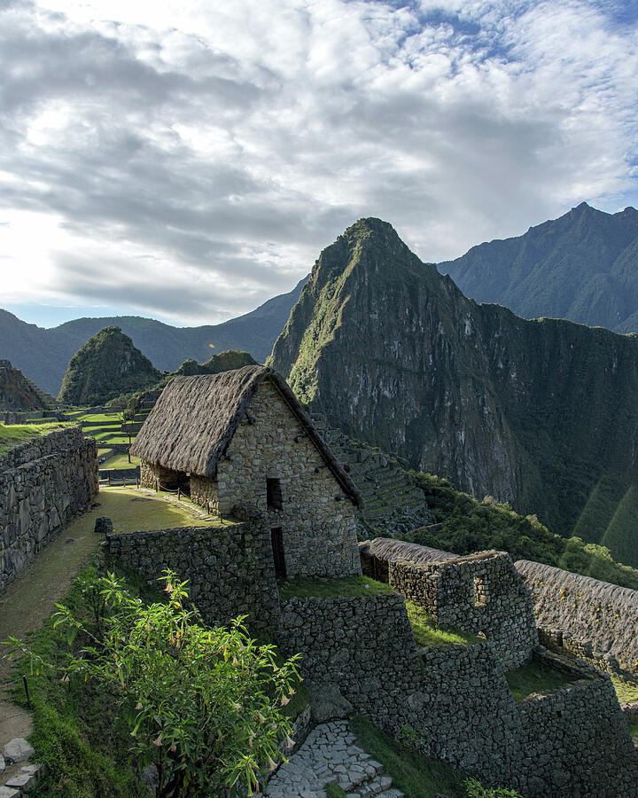 Ancient Ruins with Majestic Mountain Backdrop