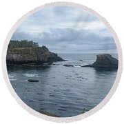 Serene Coastal Cliffs at Dawn Round Beach Towel