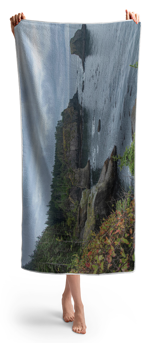 Serene Coastal Cliffs at Dawn Beach Towel