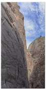 Towering Canyon Cliffs And Blue Sky Beach Towel