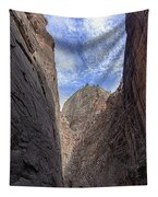 Towering Canyon Cliffs And Blue Sky Tapestry