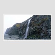 Secluded Coastal Waterfall Cascade Sticker