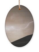 Lightning Illuminates Night Sky Ornament