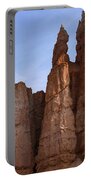 Majestic Rock Formations Under Blue Sky In Bryce Canyon National Park Portable Battery Charger