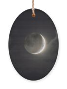 Shimmering Crescent Among Clouds Ornament