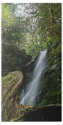Serene Waterfall in Lush Forest Beach Towel