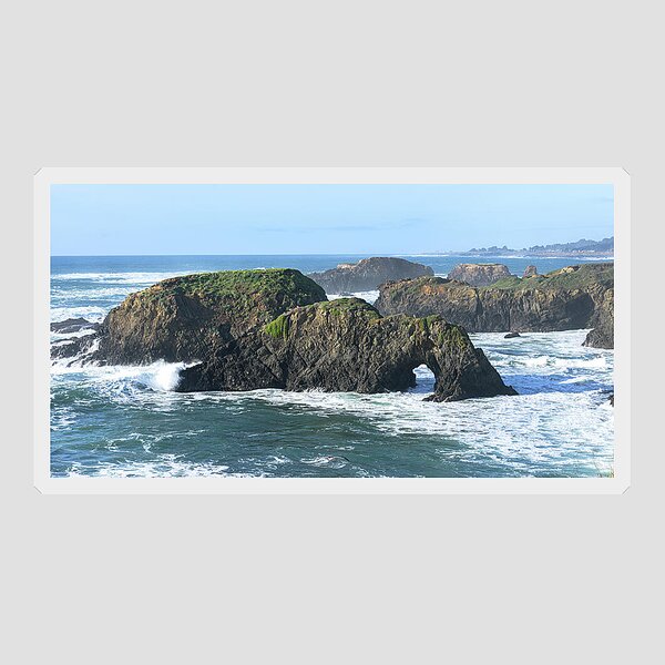 Majestic Coastal Rock Formations Sticker
