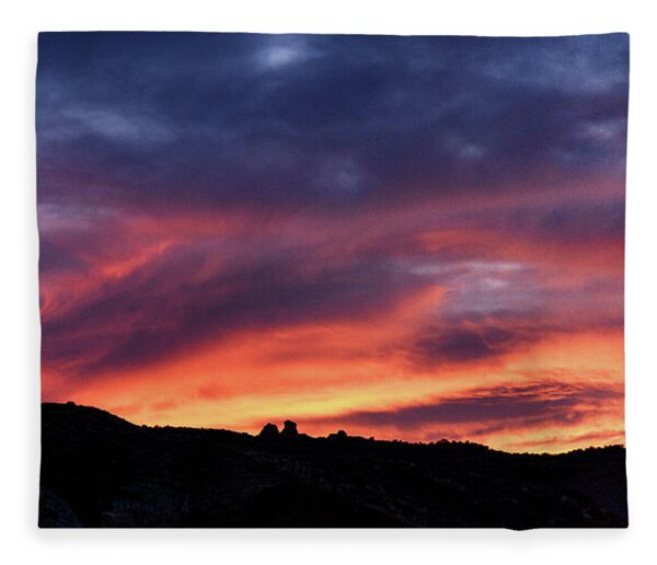 Vivid Twilight over Rocky Silhouette Fleece Blanket
