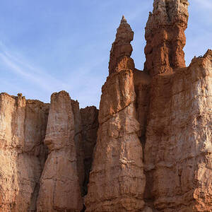 Majestic Rock Formations Under Blue Sky in Bryce Canyon National Park by Brandon Wichmann Majestic Rock Formations Under Blue Sky in Bryce Canyon National Park by Brandon Wichmann