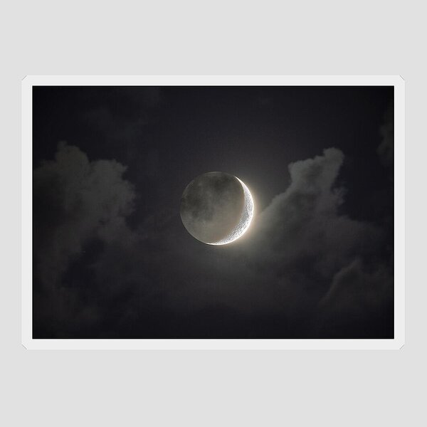 Shimmering Crescent Among Clouds Sticker