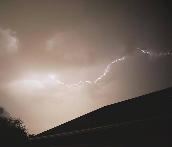 Lightning Illuminates Night Sky Poster