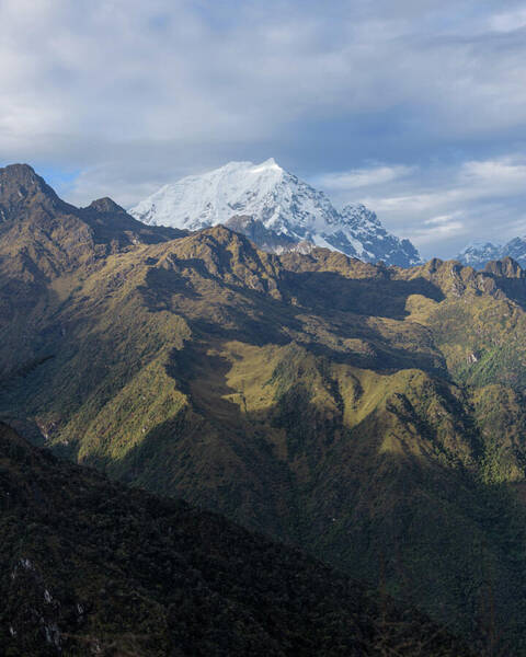 Majestic Andes Mountain Peaks Under Cloudy Sky Poster