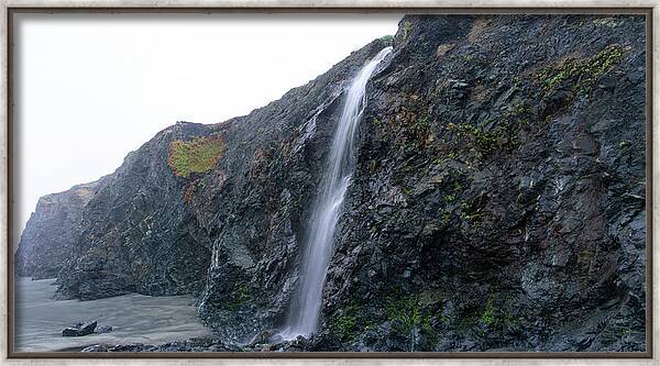 Secluded Coastal Waterfall Cascade Framed Print