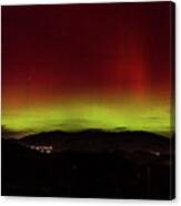 Northern Lights Over Mountain Range Canvas Print