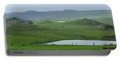 Tranquil Green Hills And Distant Sea Portable Battery Charger